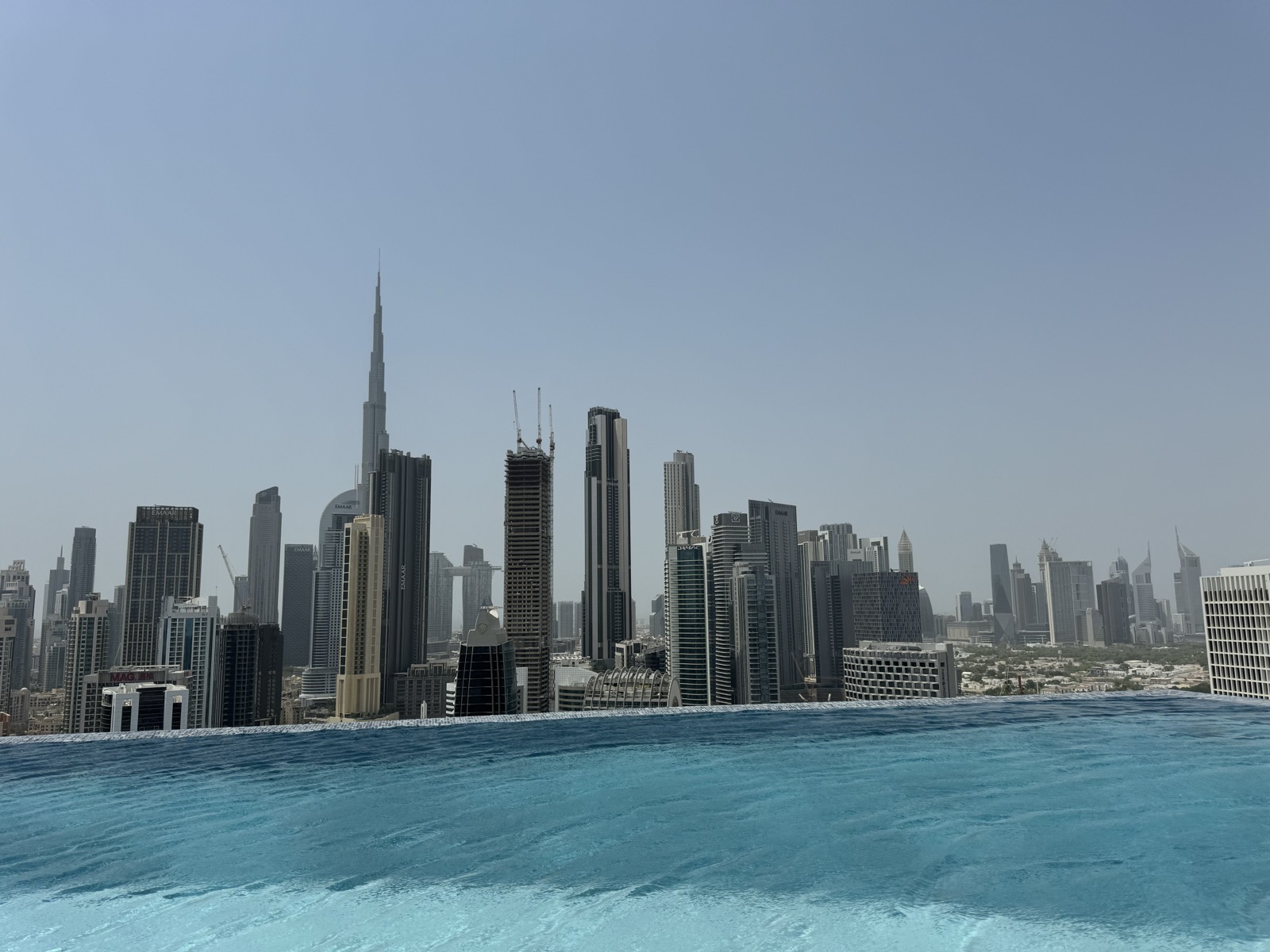 Infinity pool overlooking the Downtown Dubai skyline and Burj Khalifa